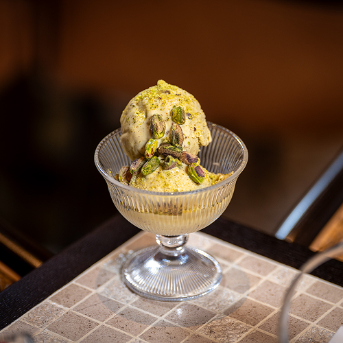 Smooth and nutty gelato with a delicate roasted pistachio flavor, offering a rich, earthy, and subtly sweet experience.