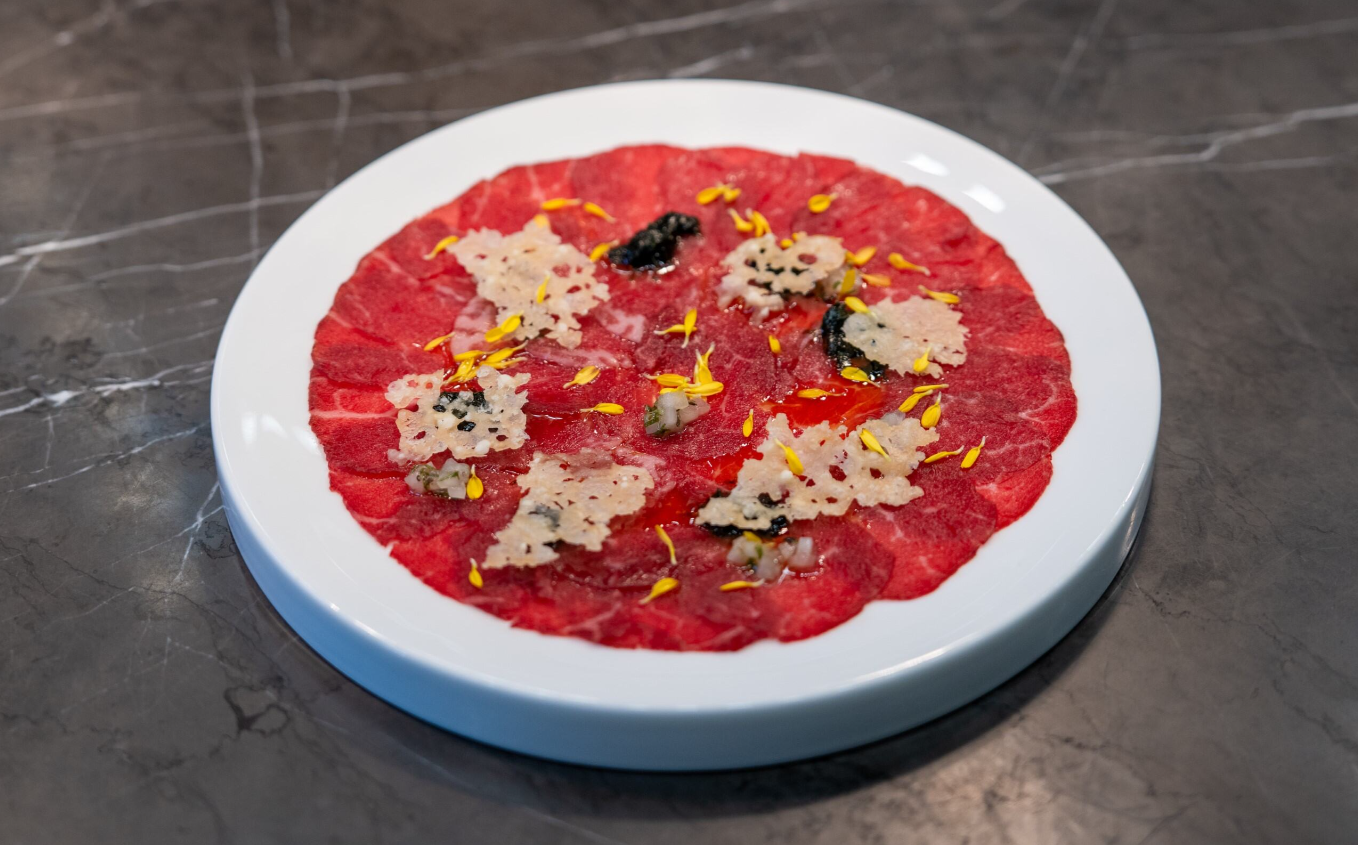 The Carpaccio di Wagyu dish for diners to indulge in melt-in-your-mouth goodness from sesame paste, shiso chimichurri, and parmesan chips.