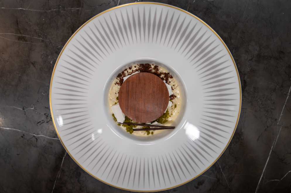 Riso al latte – a sweet encounter between cultures with Koshikari rice in evaporated milk, topped with pistachio gelato alongside chocolate and matcha powder.