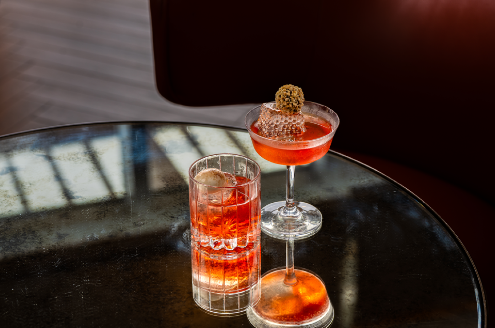 Enjoy the savory tastes of Rome with Finestra’s carbonara and pancetta-infused Roma Italia Negroni