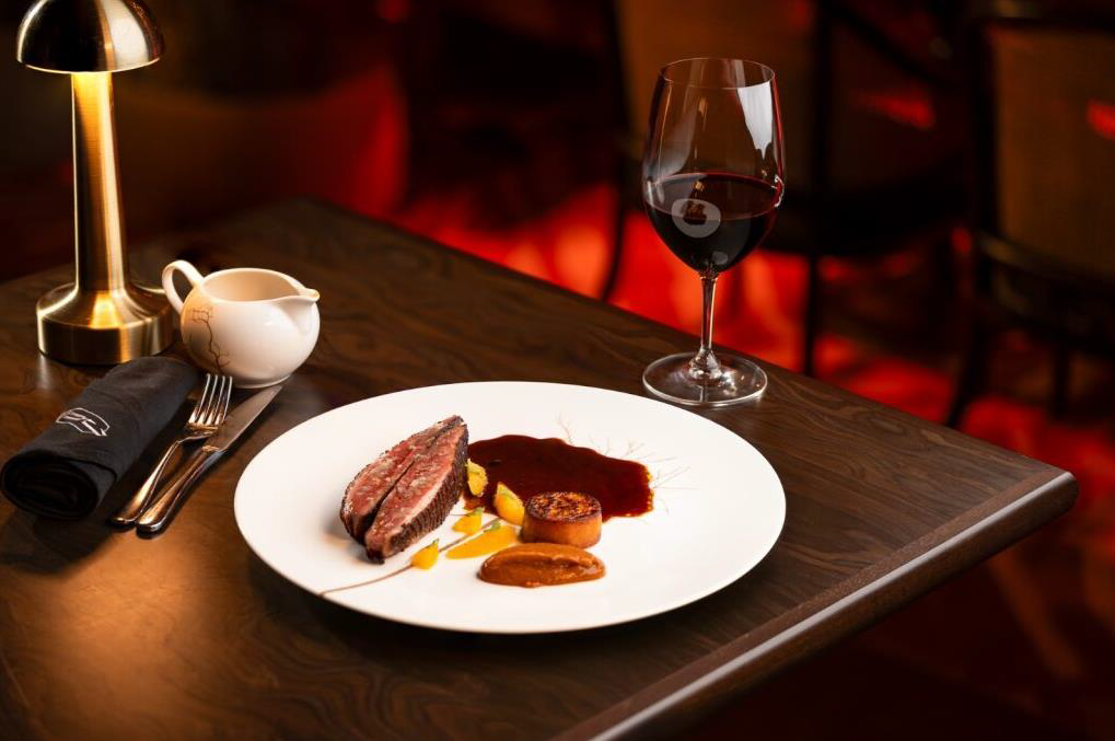 A sumptuous Wagyu Roast Ribeye awaits at Quezon Club with a dash of mashed potatoes, creamed spinach and a peppercorn jus